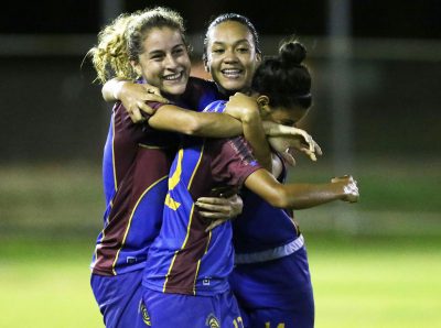 Viviana Fiol y Ashlery Rivera celebran durante el partido de la Criollas FC ante las Águilas de Añasco. Suministrada JPG Media